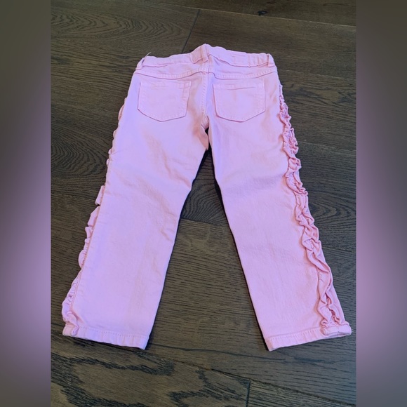 Gymboree Girls pink skinny jeans with ruffle down leg, size 5. - Picture 2 of 3